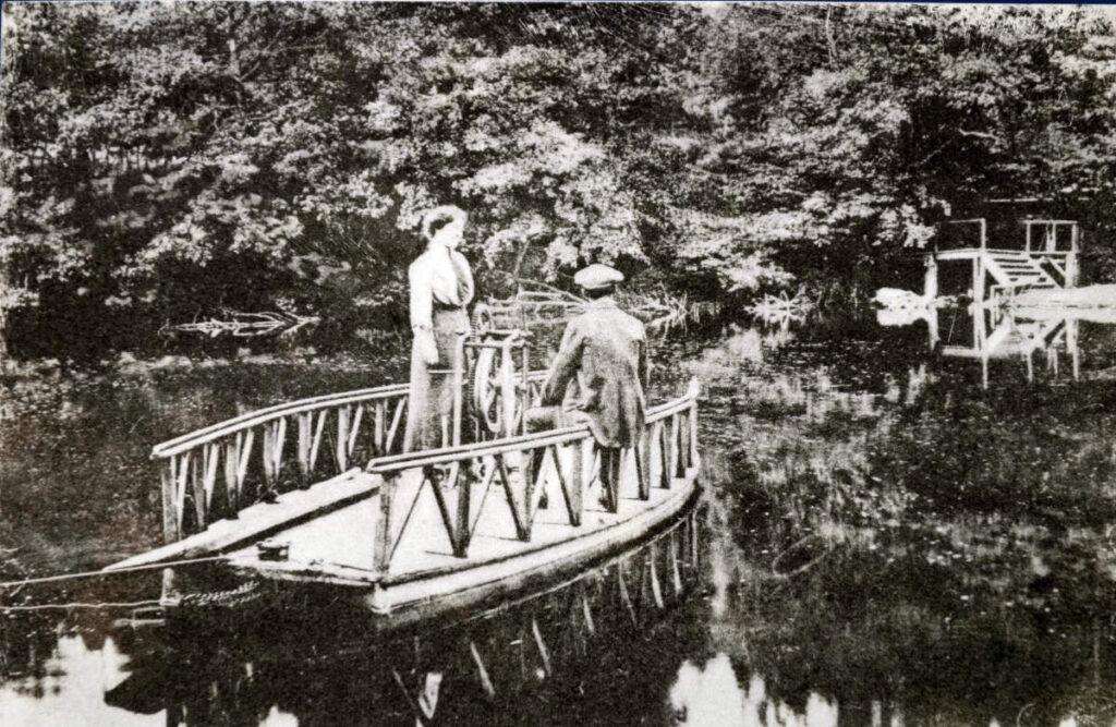 Historical photo of people crossing the river Lune on the Underley catamaran