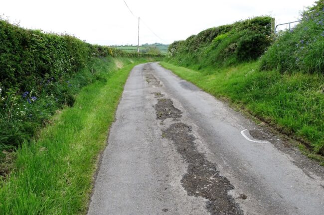 Potholes in road