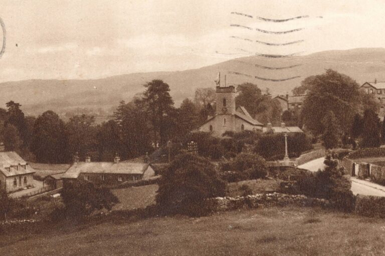 A 1947 view of Low Casterton, from left to right the buildings are, the local primary school, the Post Office, (now Ghyll Cottage), the Church, Church Cottages, War Memorial, various Clergy Daughters School buildings and the Village Hall.
