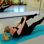 Woman doing Pilates exercise
