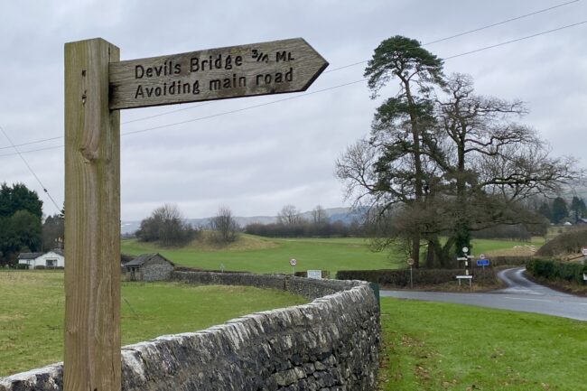 Sign to safe walking route to Devil’s Bridge Sign to safe walking route to Devil's Bridge
