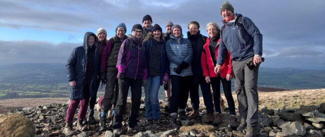 Casterton walkers at the top of Brownthwaite