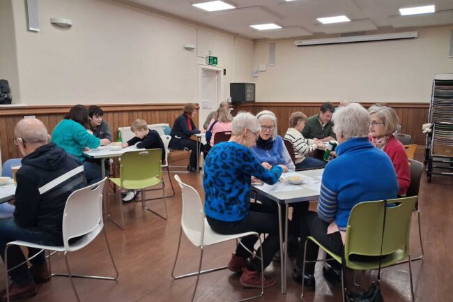 Beetle drive competitors in Casterton Village Hall