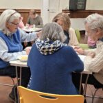Beetle drive competitors in Casterton Village Hall