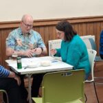 Beetle drive competitors in Casterton Village Hall