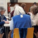 Beetle drive competitors in Casterton Village Hall
