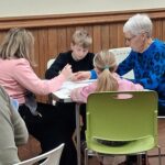 Beetle drive competitors in Casterton Village Hall