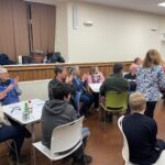 Beetle drive competitors in Casterton Village Hall