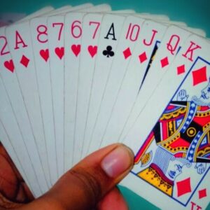 playing cards in a hand