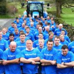 Volunteers pulling a tractor from Sedbergh to Kendal